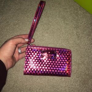 hot pink Kate Spade wristlet